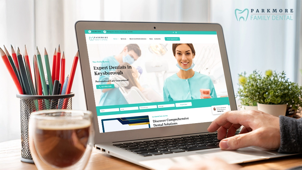 Dental SEO Success: Parkmore Family Dental’s Organic Growth Story – A user browsing the dental clinic’s professional website on a laptop, showcasing its clean design, SEO-optimized content, and a trusted dental team in Keysborough.